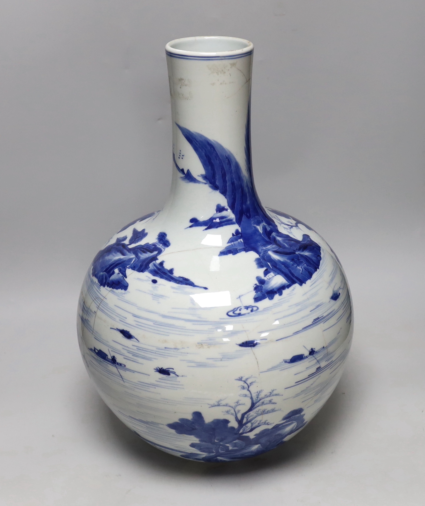 A large Chinese blue and white bottle vase, (a.f) 45cm